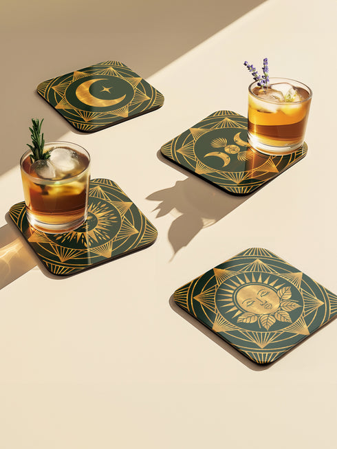 A set of four square coasters with a glossy finish, featuring celestial gold designs on a deep forest green background. Each coaster showcases a unique motif: a stylized sun with a serene face, a crescent moon with a star, a triple moon symbol with botanical elements, and a radiant sunburst. The intricate gold linework creates an art deco-inspired, mystical aesthetic. Made from durable materials, these coasters blend elegance with celestial charm.